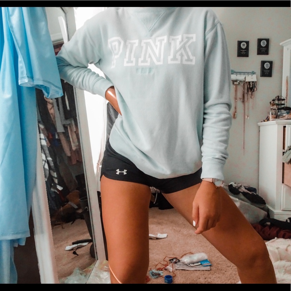 pink pullover blue